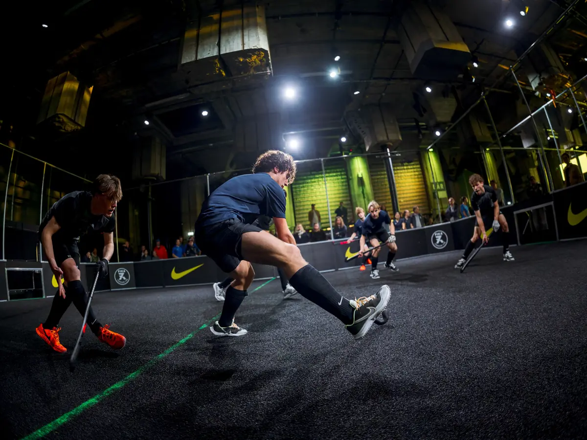 Players battling at the Nike 3v3 hockey event