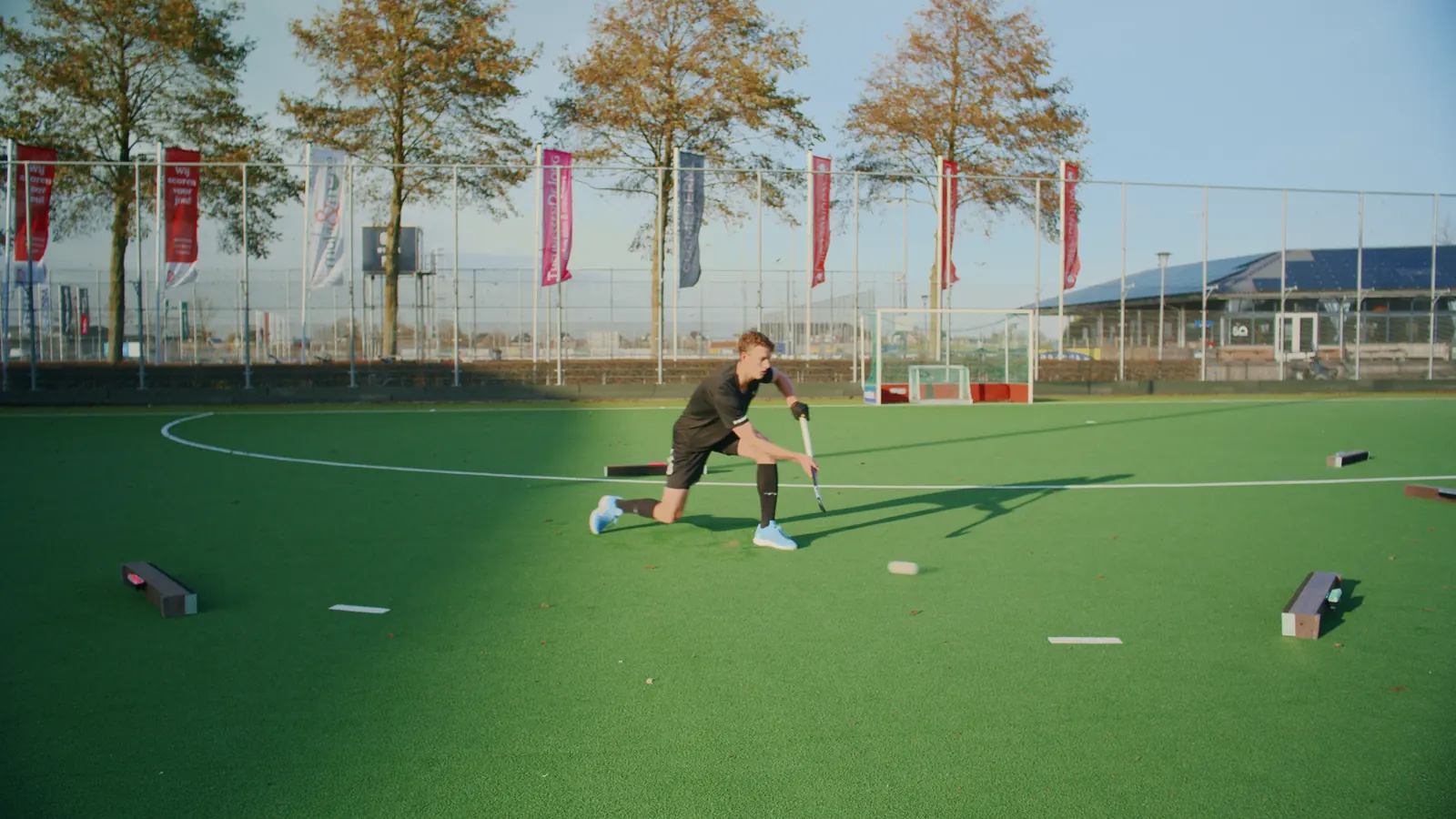 Hockey player playing between two Beams on rebound boards