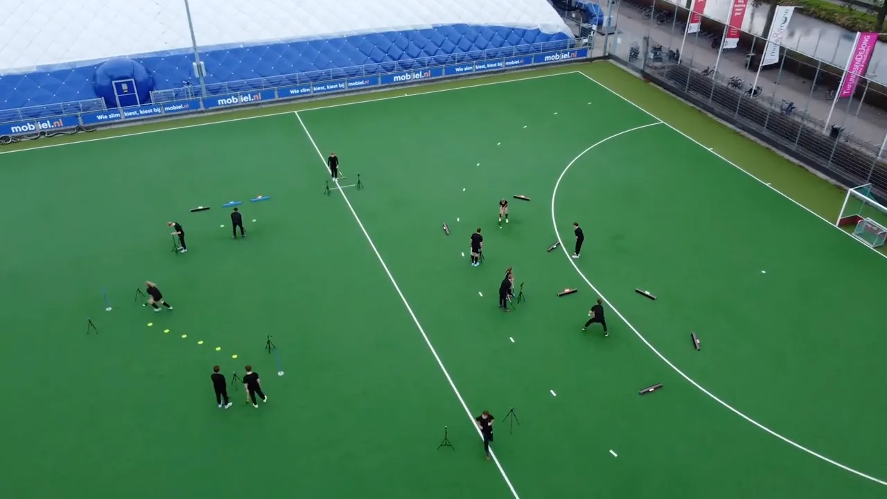 Drone view of a team training with Beams on a hockey pitch
