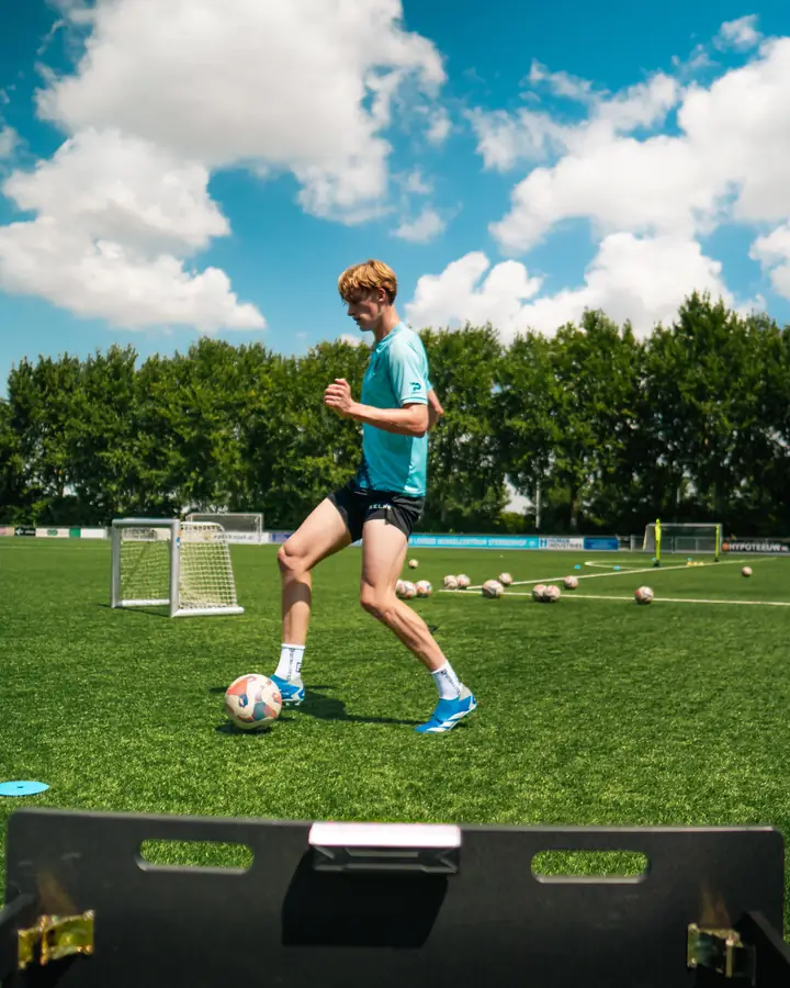 Young player trains at home on the rebounder