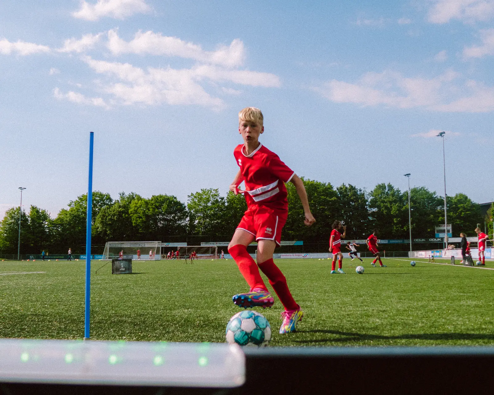 Alphense Boys youth player dribbles past a Beam during an X-Skills team training
